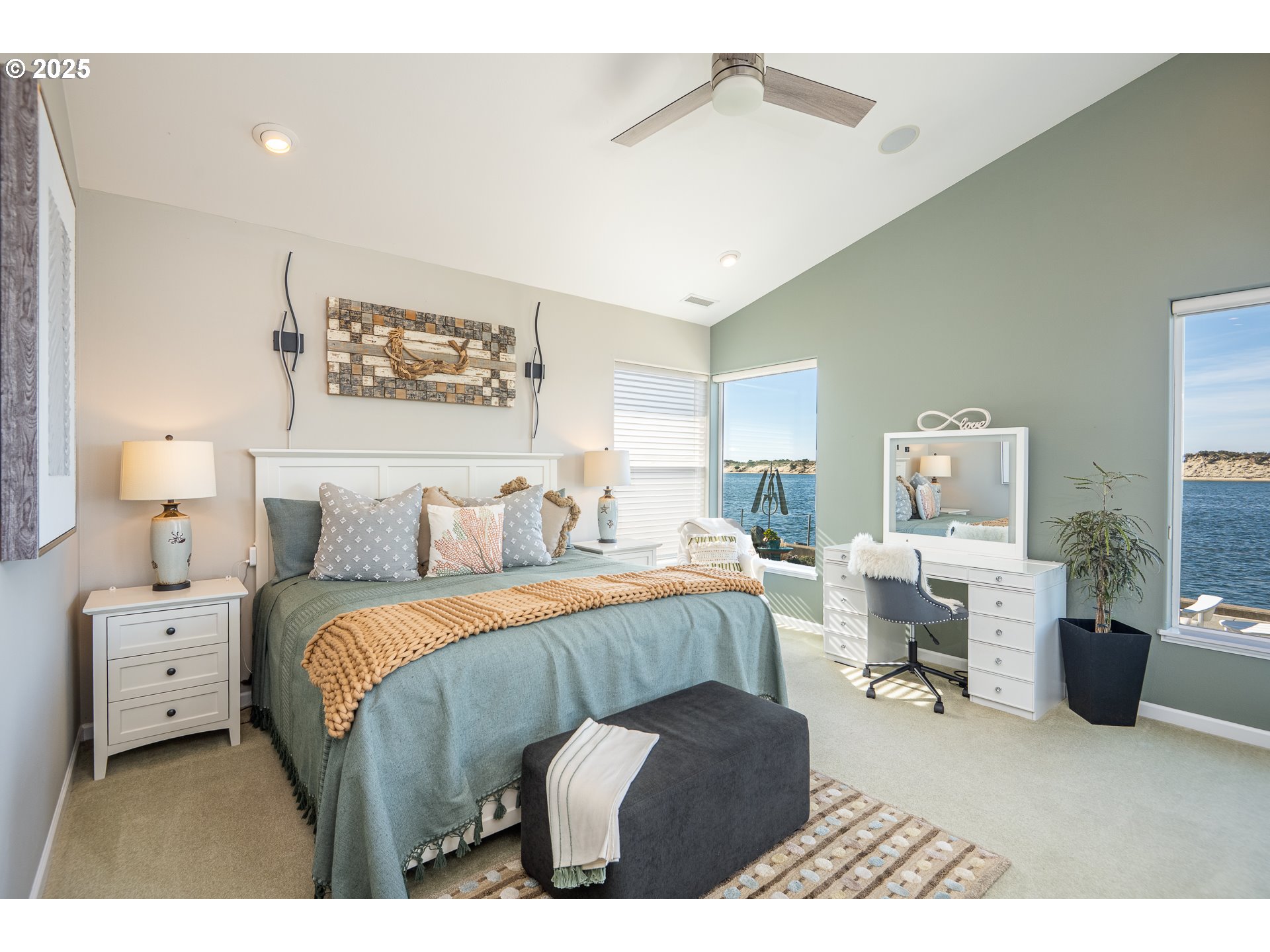 3315 Rhododendron Drive Florence, OR 97439 - Photo 31 of 48 a bedroom with a bed and a table