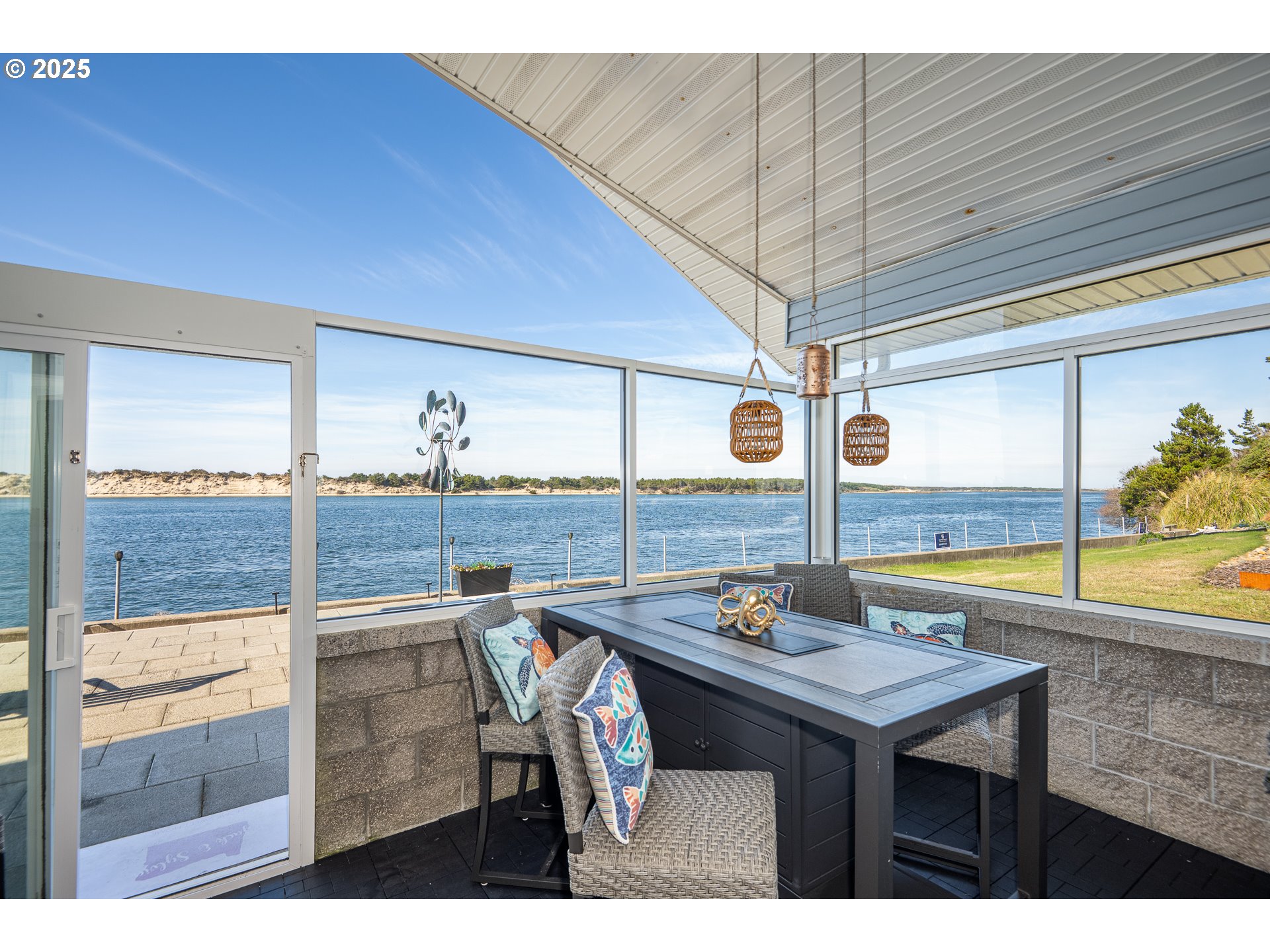 3315 Rhododendron Drive Florence, OR 97439 - Photo 33 of 48 a view of a dining room with furniture and wooden floor