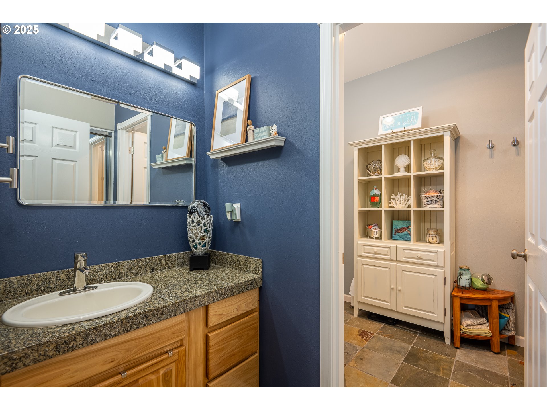 3315 Rhododendron Drive Florence, OR 97439 - Photo 38 of 48 a bathroom with a sink and a mirror