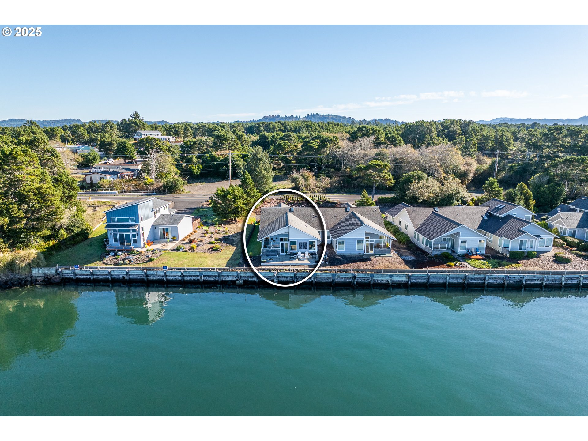 3315 Rhododendron Drive Florence, OR 97439 - Photo 45 of 48 a view of a swimming pool with lawn chairs and a table