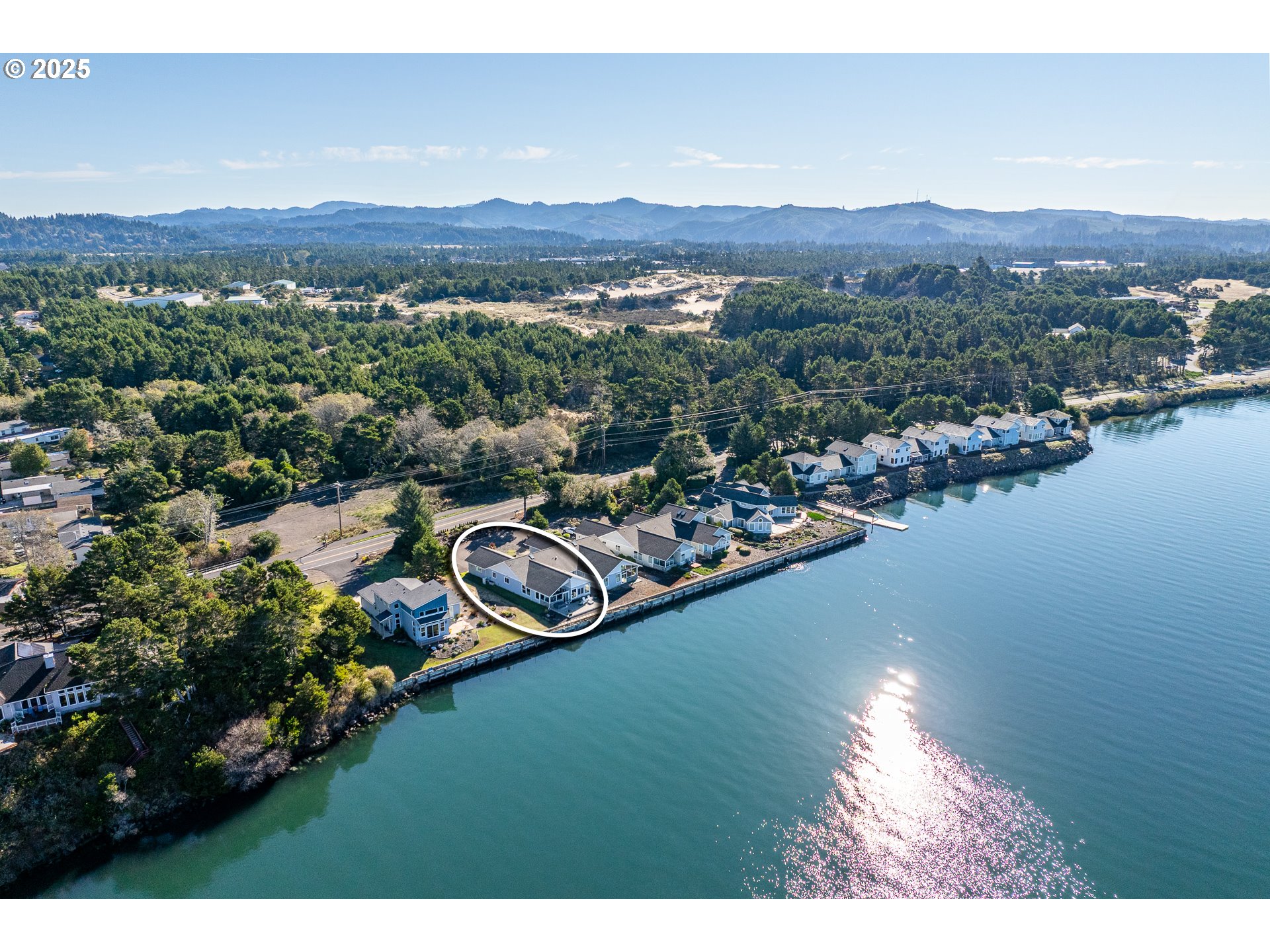 3315 Rhododendron Drive Florence, OR 97439 - Photo 47 of 48 a view of a city with lake view