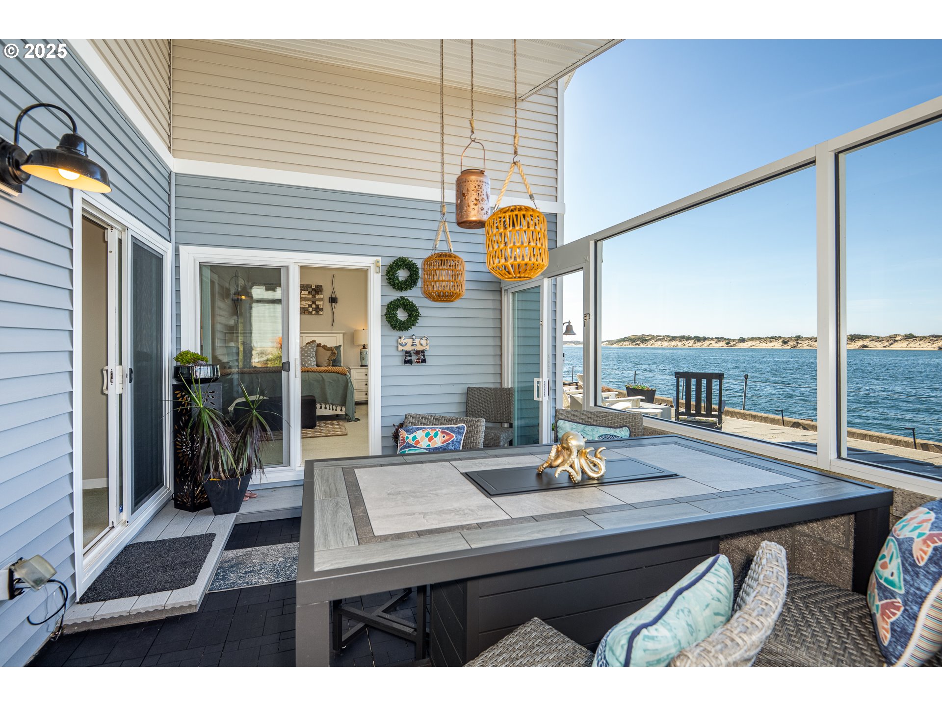 3315 Rhododendron Drive Florence, OR 97439 - Photo 7 of 48 a living room with fireplace furniture and a window