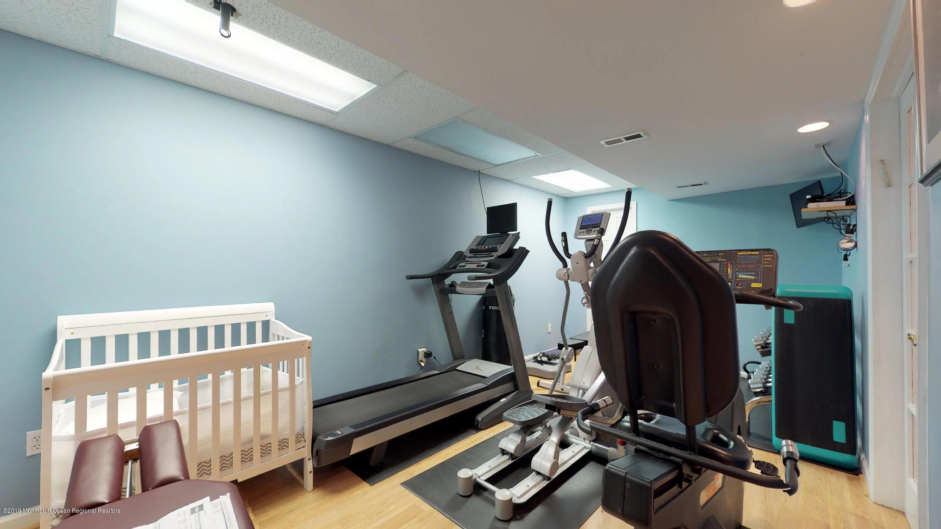 79 Georgetown Road Eatontown, NJ 07724 - Photo 36 of 37 79-Georgetown-Rd-Person-Gym-area