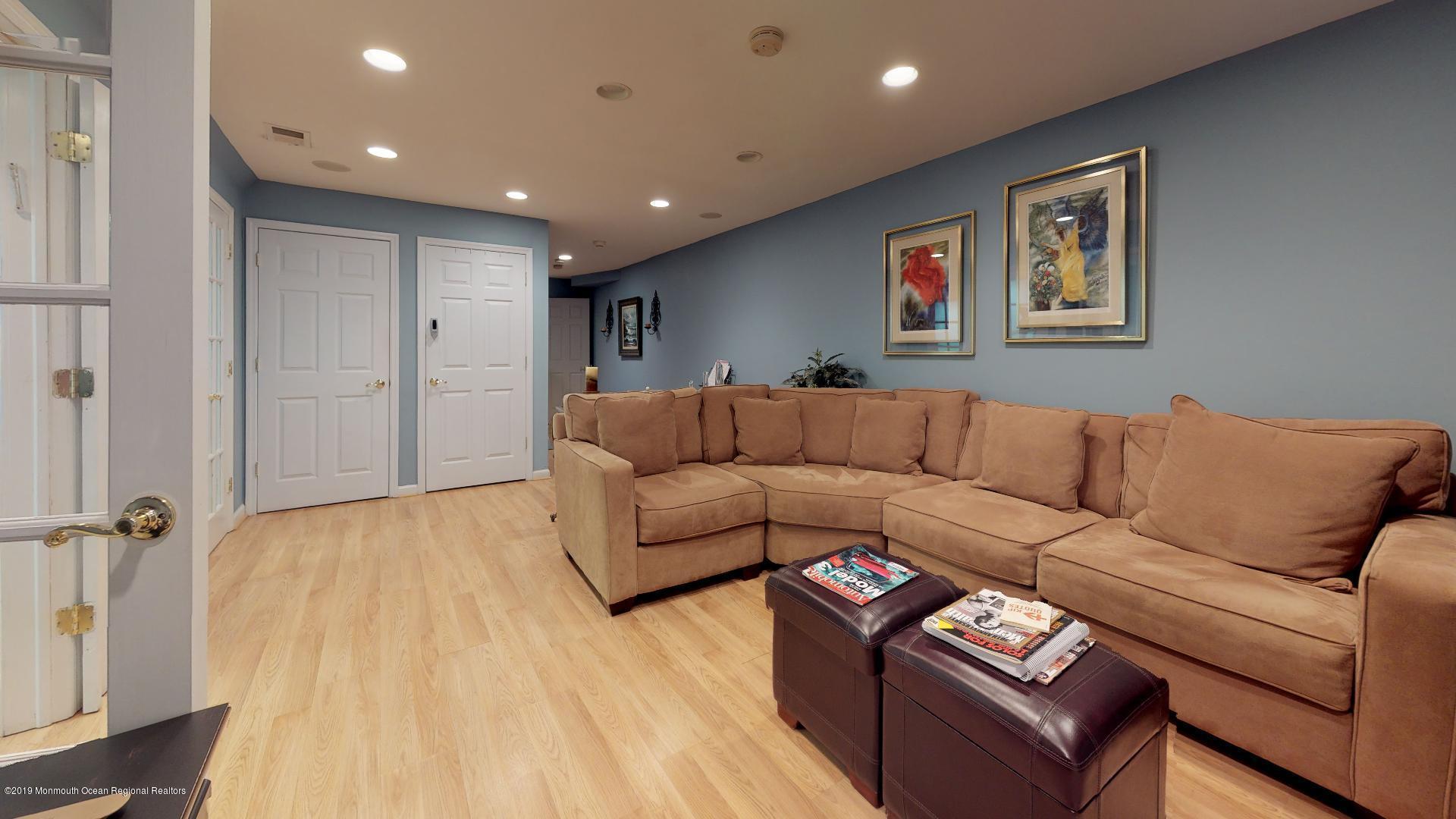 79 Georgetown Road Eatontown, NJ 07724 - Photo 7 of 37 79-Georgetown-Rd-Basement-Living-Room-1
