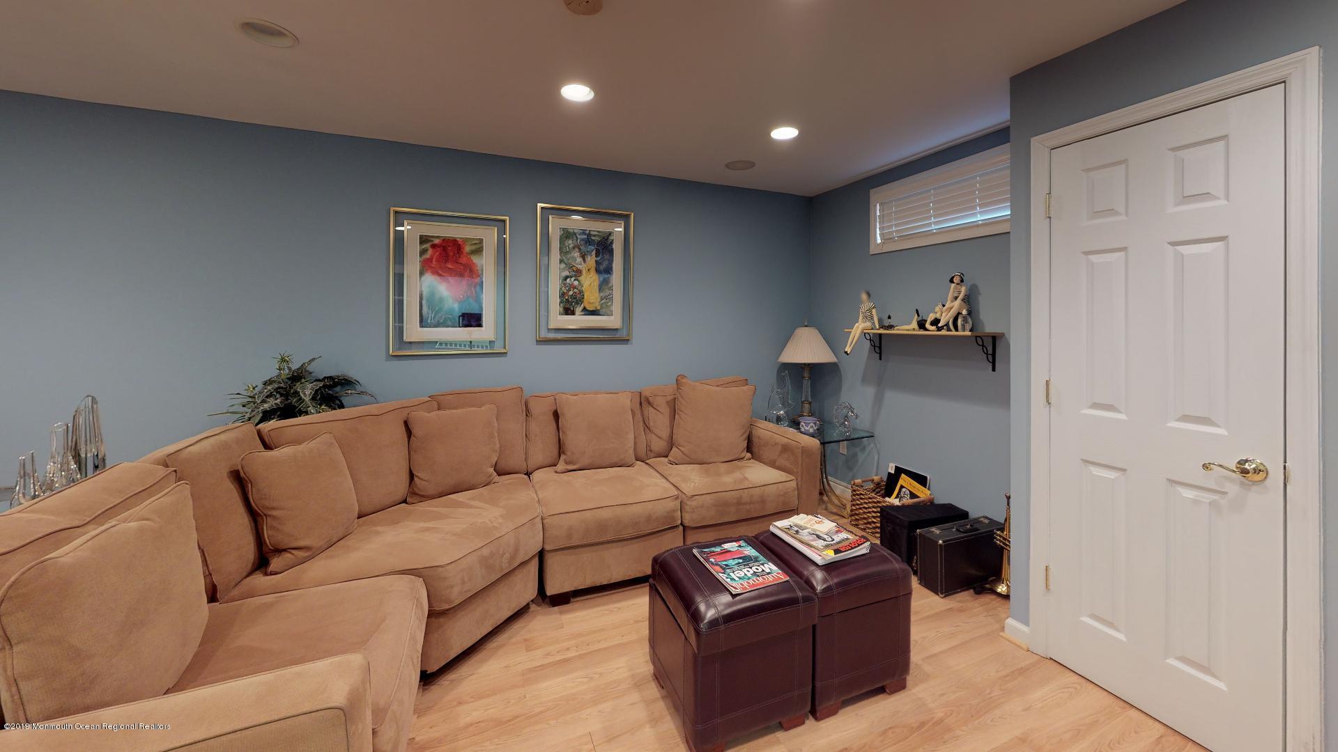 79 Georgetown Road Eatontown, NJ 07724 - Photo 8 of 37 79-Georgetown-Rd-Basement-Living-Room-2
