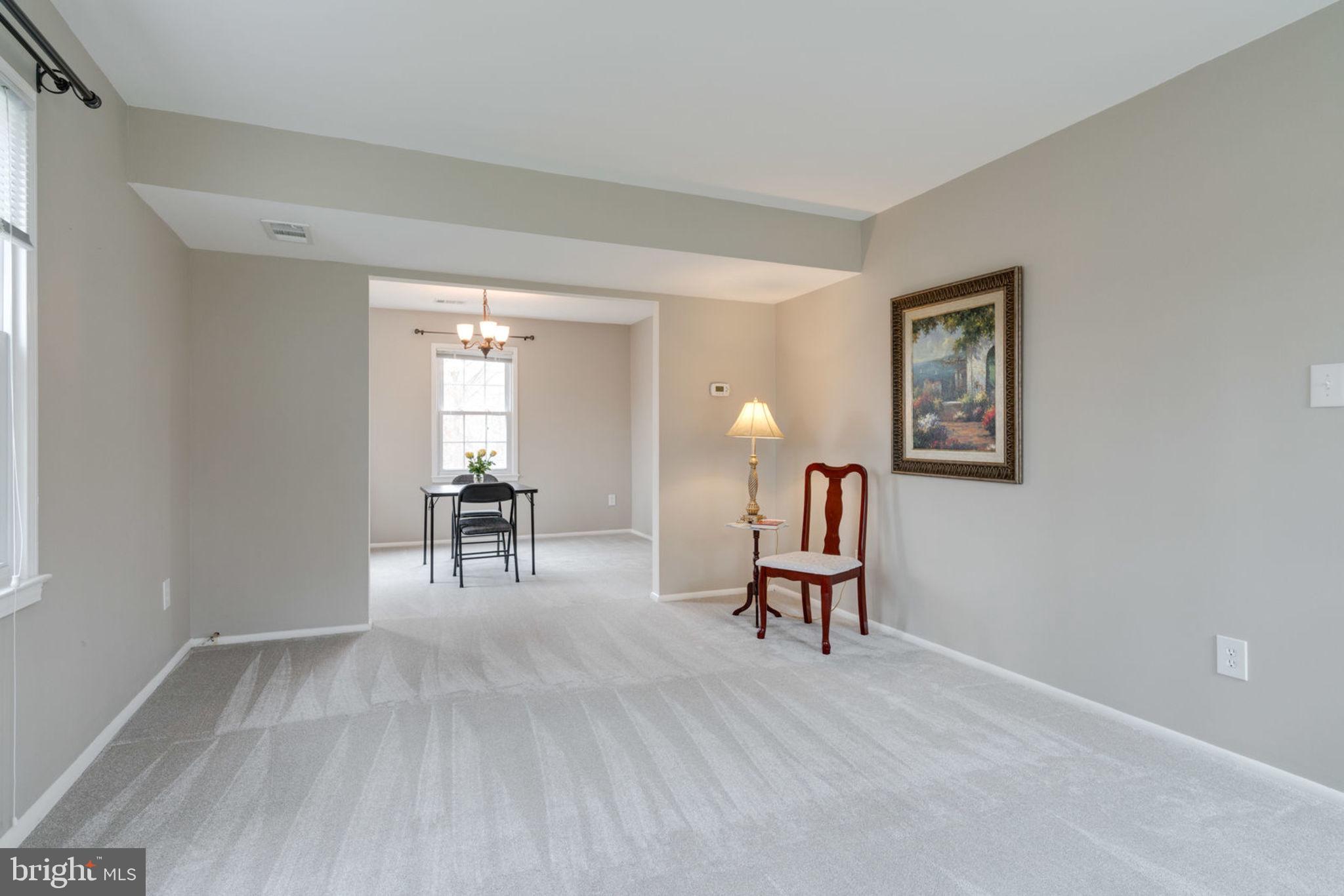 7759 Euclid Way Springfield, VA 22153 - Photo 18 of 65 Living room with new carpet