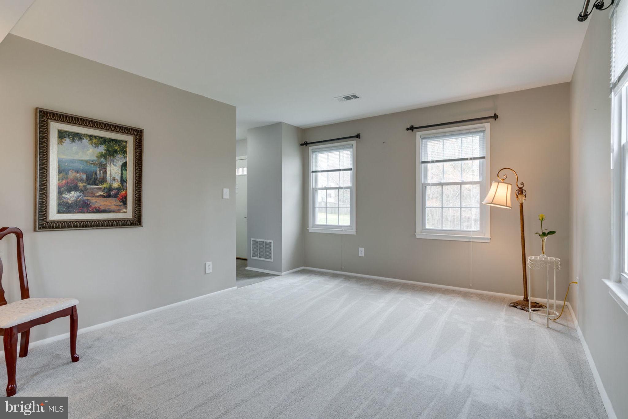 7759 Euclid Way Springfield, VA 22153 - Photo 19 of 65 Living room with front entrance to the left