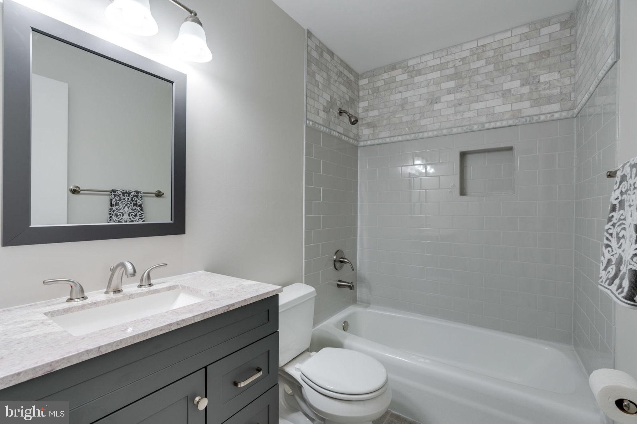 7759 Euclid Way Springfield, VA 22153 - Photo 32 of 65 Totally new bathroom with spectacular tile
