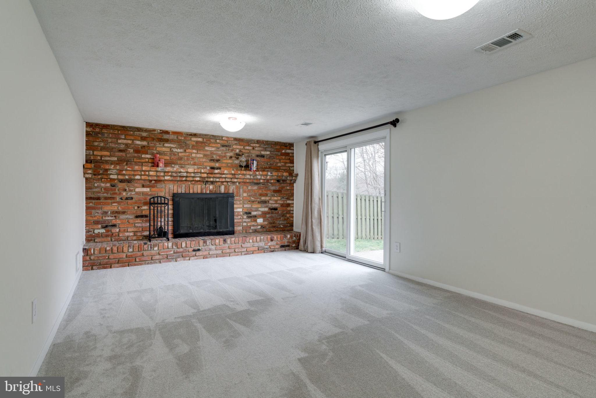 7759 Euclid Way Springfield, VA 22153 - Photo 43 of 65 Wood fireplace screen & tools