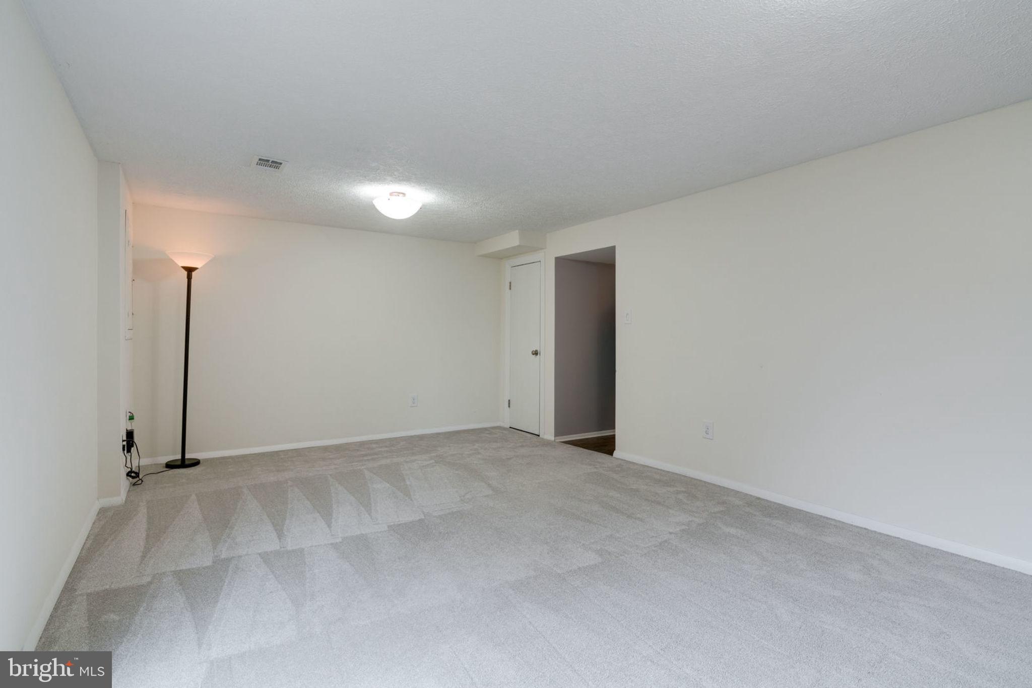 7759 Euclid Way Springfield, VA 22153 - Photo 48 of 65 Lower level den - view from fireplace