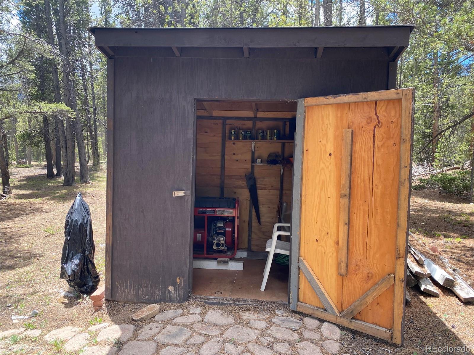 50 County Road Como, CO 80432 - Photo 7 of 25 a view of backyard with tub and wooden fence