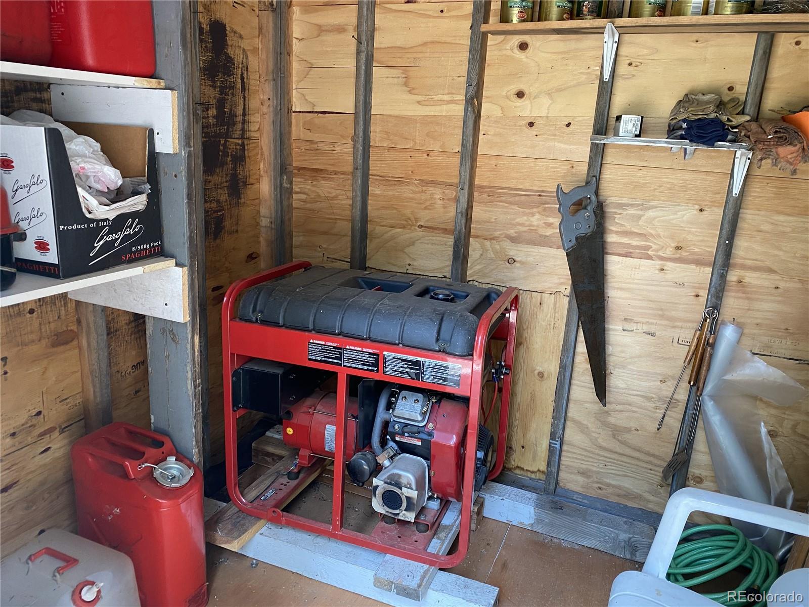 50 County Road Como, CO 80432 - Photo 8 of 25 a bedroom with a bed and a window