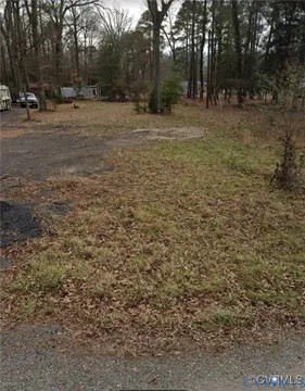 1063 Sholey Road Henrico, VA 23231 - Photo 1 of 1 a view of dirt field with trees
