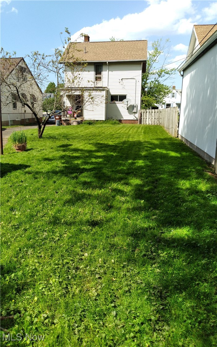 7603 Ridgefield Avenue Parma, OH 44129 - Photo 15 of 16 Back of house from far at the rear of lot.