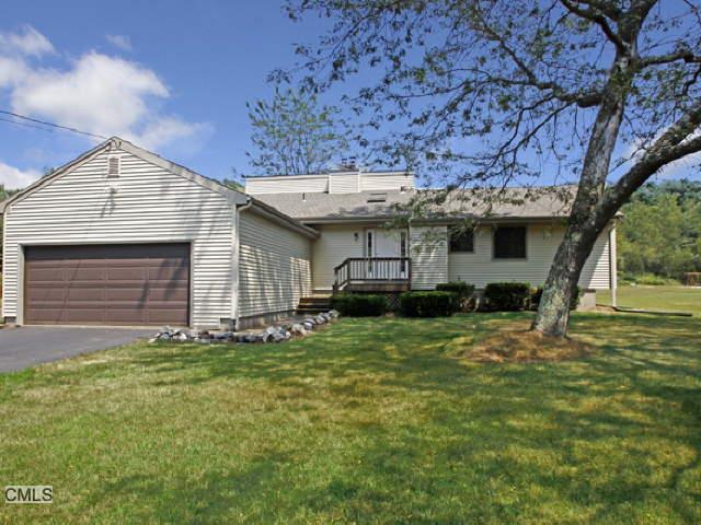 113 High Rock Road Newtown, CT 06482 - Photo 1 of 1 a view of a house with a yard