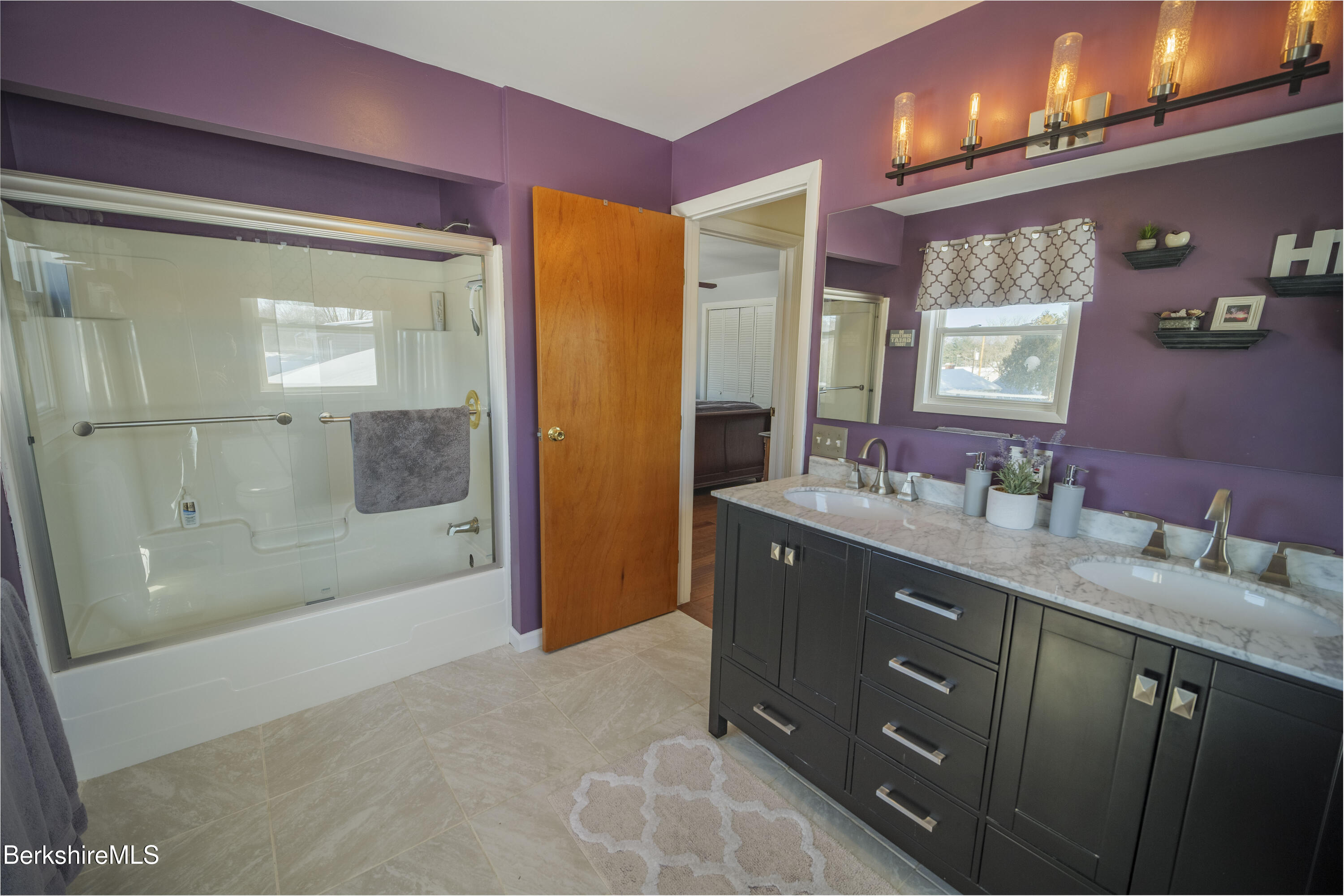 582 East New Lenox Road Pittsfield, MA 01201 - Photo 11 of 23 a bathroom with a granite countertop sink mirror shower and double