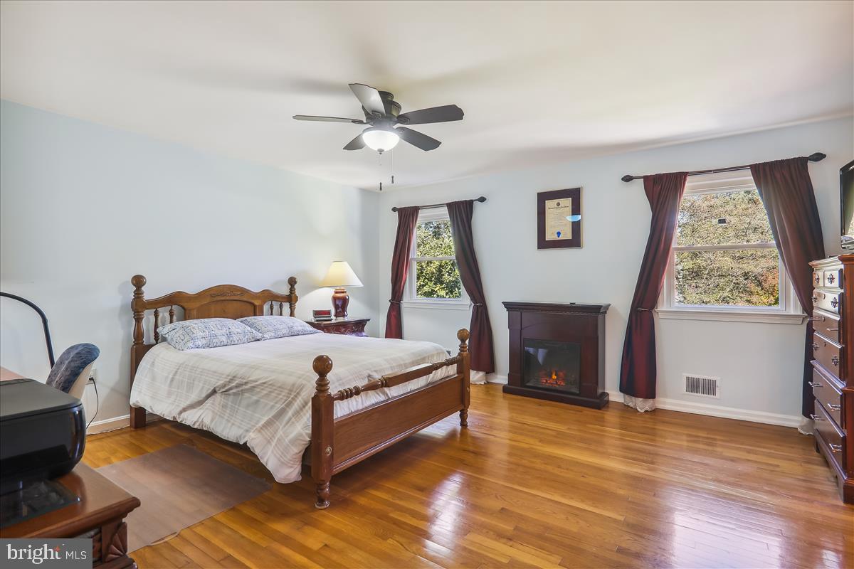 7301 Needwood Road Derwood, MD 20855 - Photo 27 of 59 Primary bedroom Hardwood floors