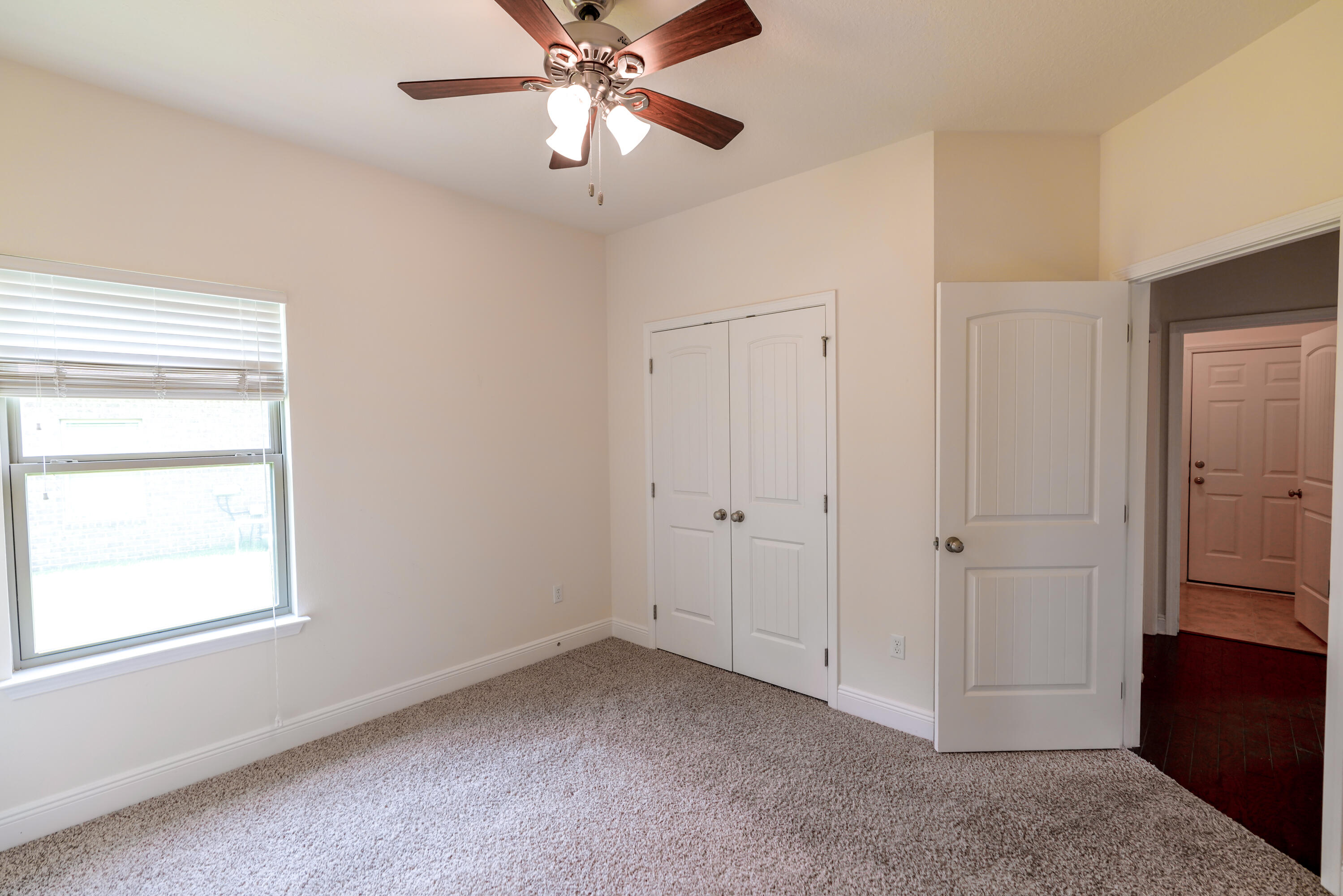 122 Riverbirch Loop Santa Rosa Beach, FL 32459 - Photo 17 of 41 a view of an empty room with a window