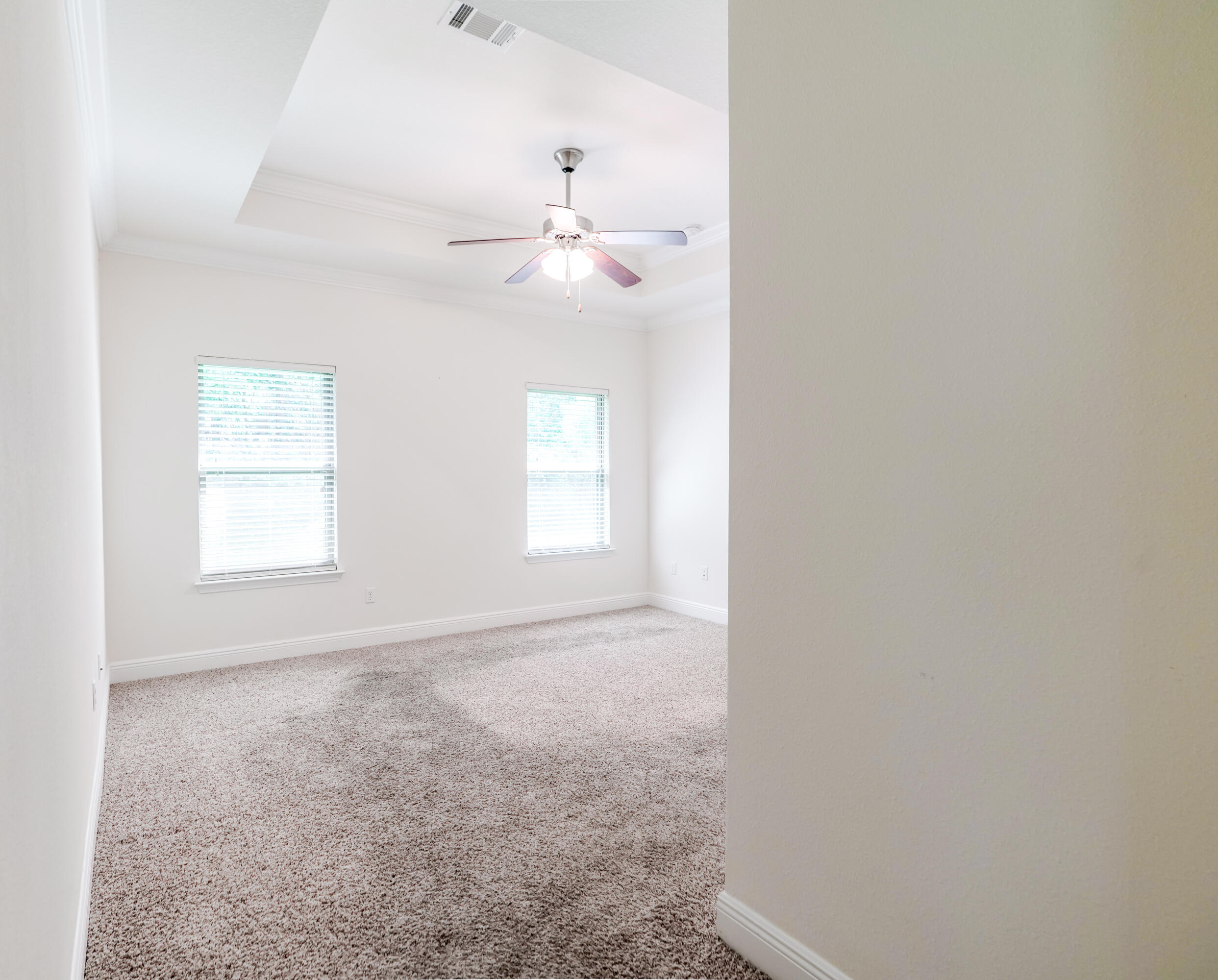 122 Riverbirch Loop Santa Rosa Beach, FL 32459 - Photo 25 of 41 an empty room with a window and a ceiling fan