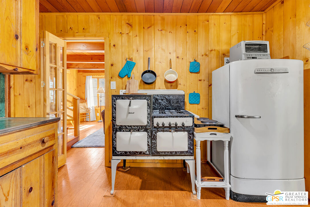 25250 Rim Rock Road Idyllwild, CA 92549 - Photo 19 of 72 a living room with furniture and a table