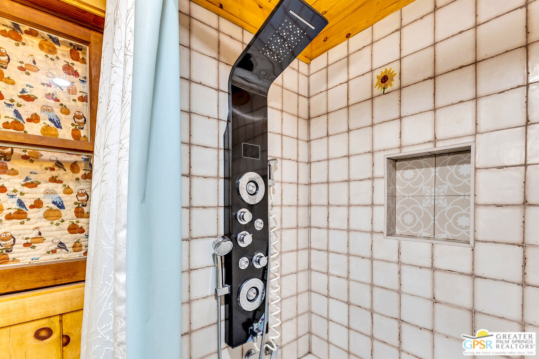 25250 Rim Rock Road Idyllwild, CA 92549 - Photo 37 of 72 a bathroom with a shower and a sink