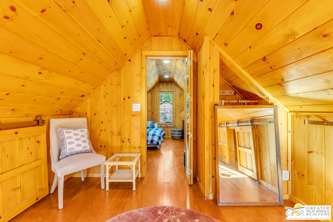 25250 Rim Rock Road Idyllwild, CA 92549 - Photo 46 of 72 a view of a swimming pool with seating area