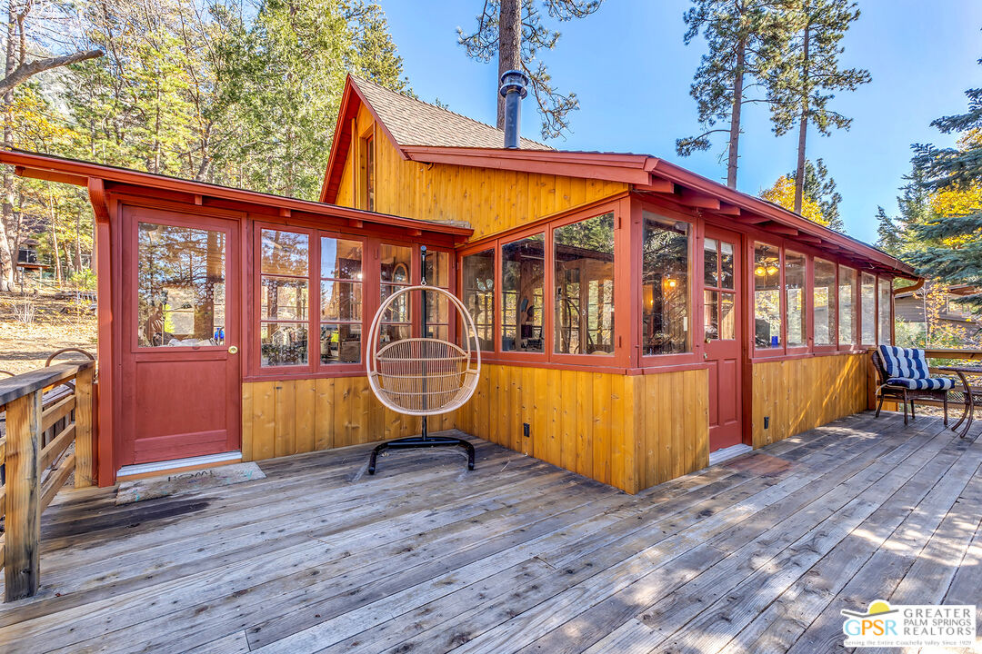 25250 Rim Rock Road Idyllwild, CA 92549 - Photo 48 of 72 a view of a house with wooden floor and a swimming pool