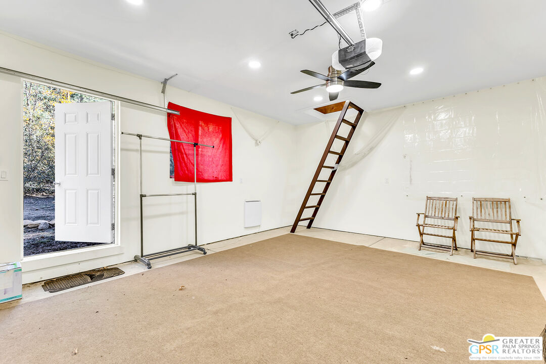 25250 Rim Rock Road Idyllwild, CA 92549 - Photo 63 of 72 a view of an empty room with a window