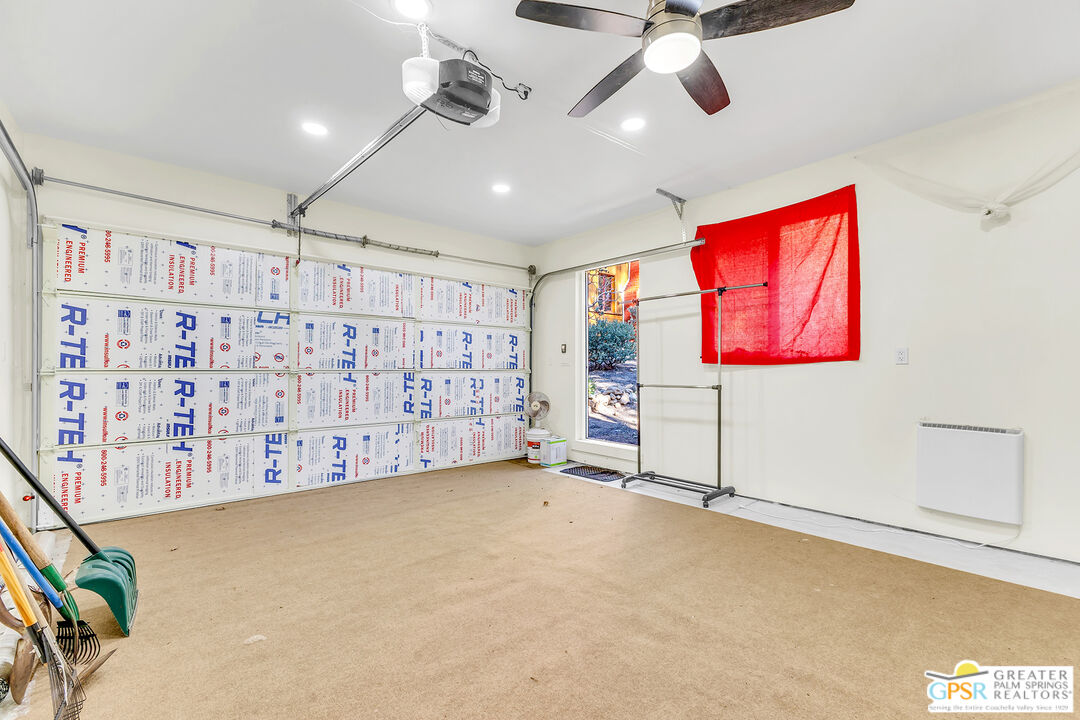 25250 Rim Rock Road Idyllwild, CA 92549 - Photo 64 of 72 a view of an empty room with a ceiling fan