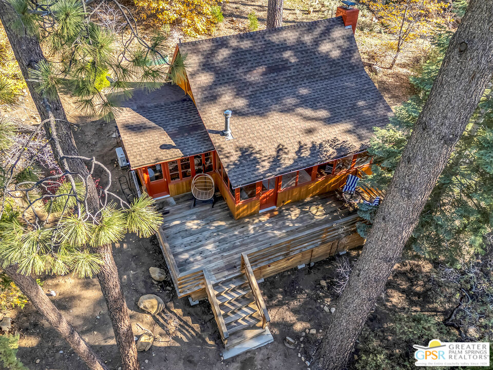 25250 Rim Rock Road Idyllwild, CA 92549 - Photo 8 of 72 a view of a house with a yard