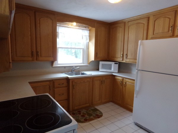 493 Maple Road Longmeadow, MA 01106 - Photo 5 of 20 a kitchen with a refrigerator and a sink