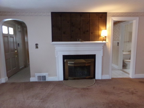 493 Maple Road Longmeadow, MA 01106 - Photo 8 of 20 a view of a livingroom with a fireplace
