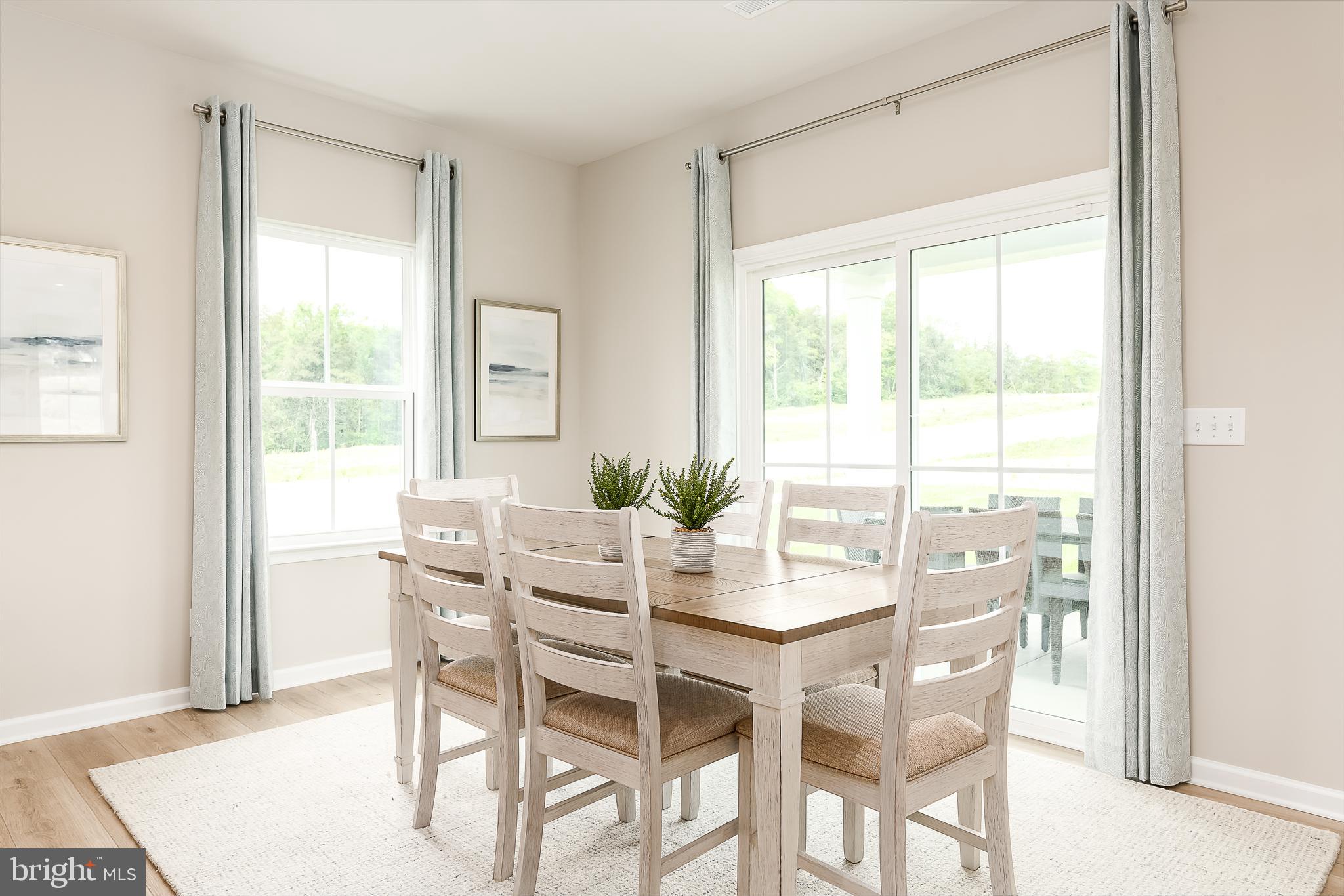 1018 Wallace Way Ranson, WV 25438 - Photo 8 of 23 a dining room with furniture and window