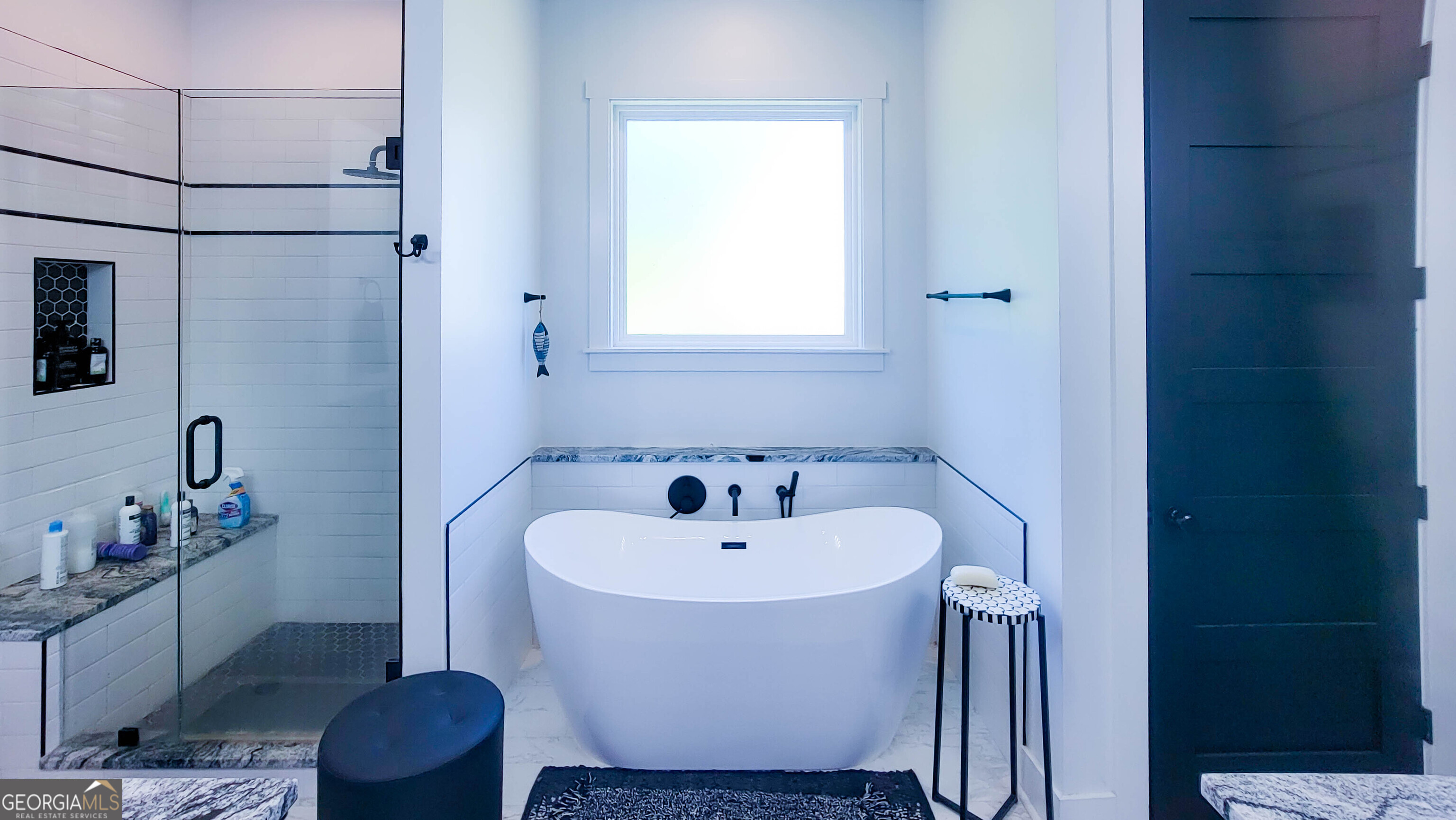 209 Lee Road Salem, AL 36874 - Photo 17 of 37 a bathroom with a sink and mirror with bathtub