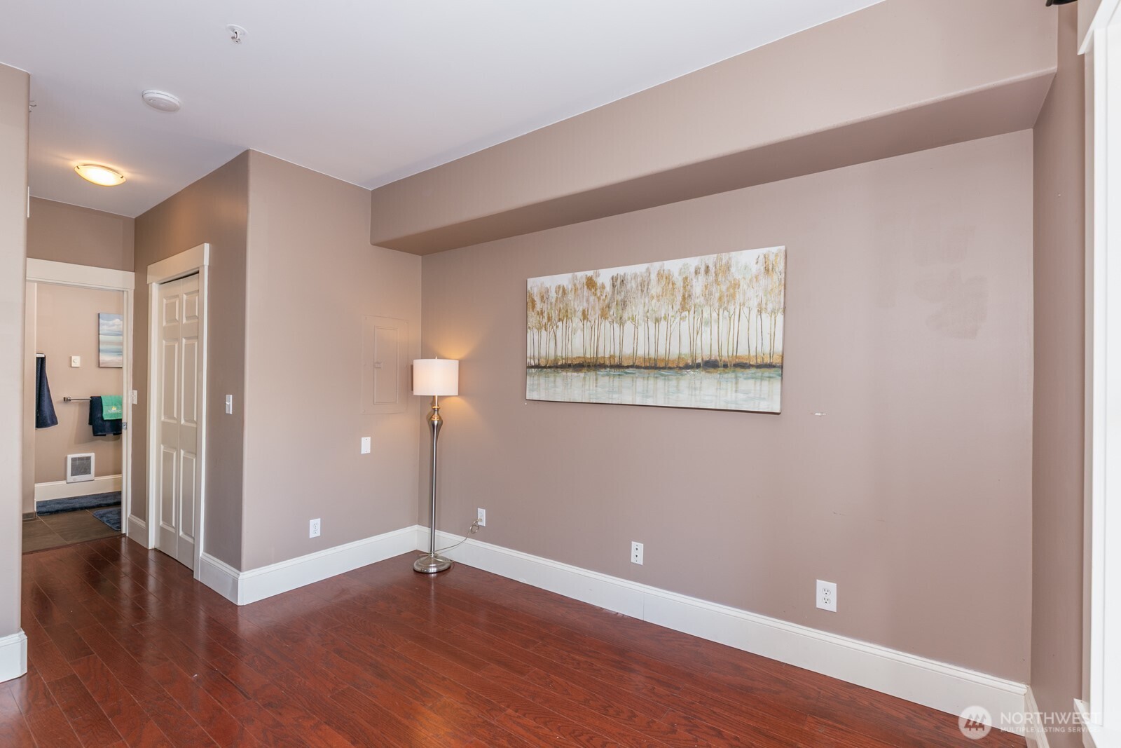 3221 Southwest Avalon Way, Unit 201 Seattle, WA 98126 - Photo 17 of 39 wooden floor in an empty room with a window