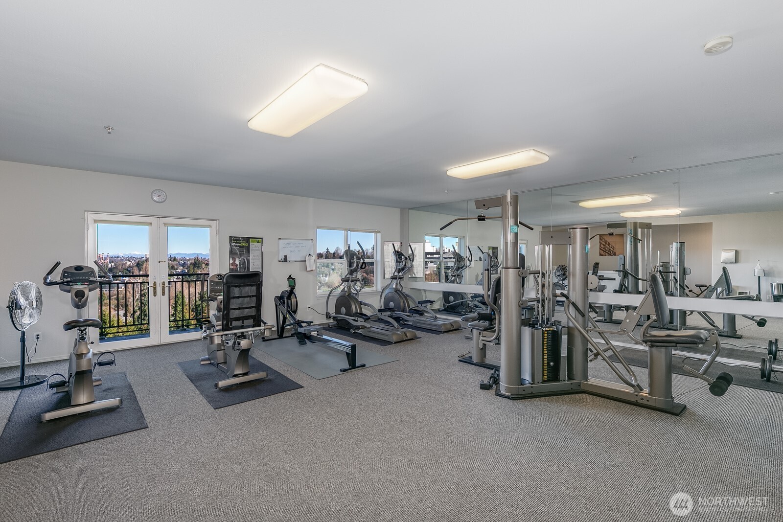 3221 Southwest Avalon Way, Unit 201 Seattle, WA 98126 - Photo 28 of 39 a view of a room with gym equipment