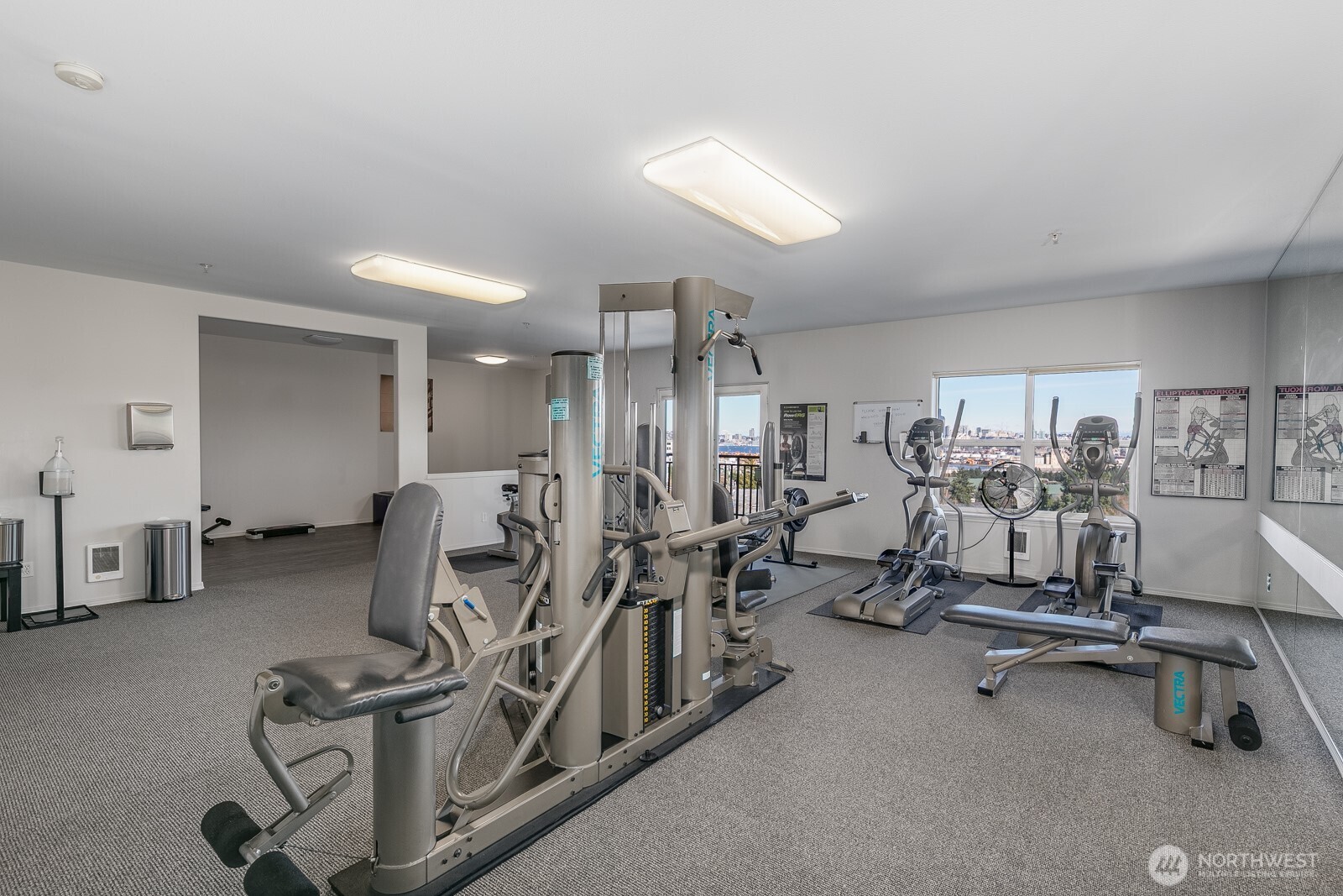 3221 Southwest Avalon Way, Unit 201 Seattle, WA 98126 - Photo 29 of 39 a view of a room with gym equipment