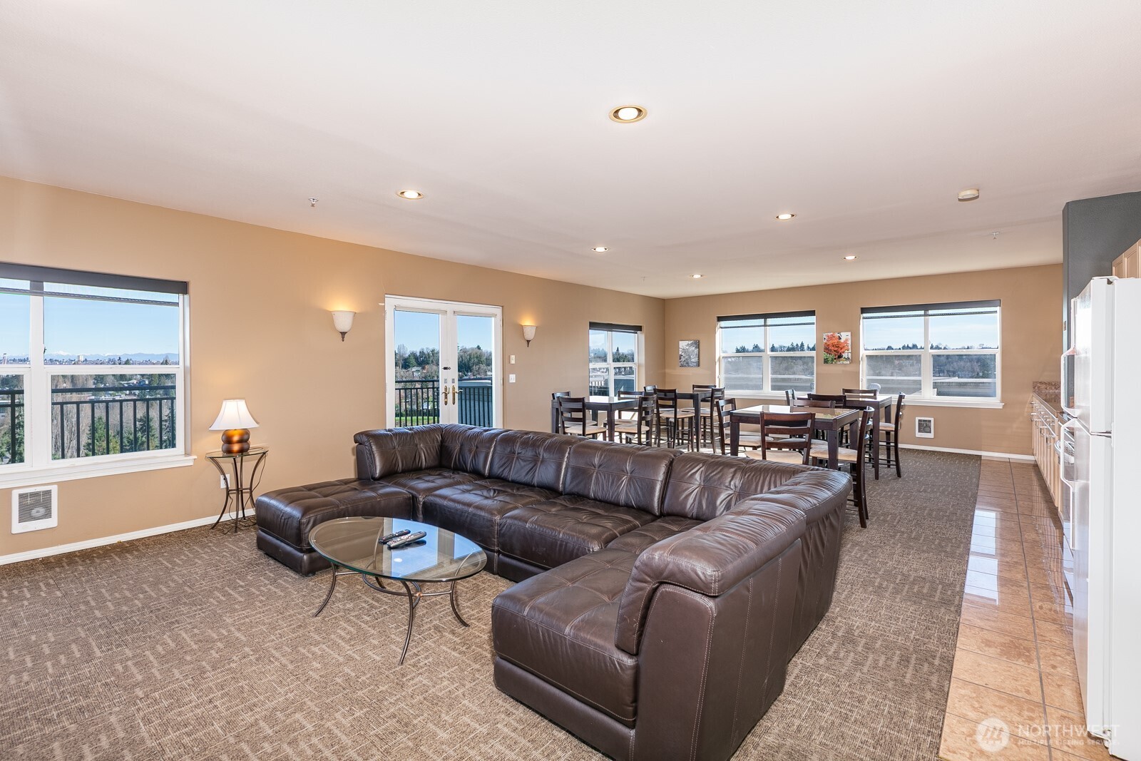 3221 Southwest Avalon Way, Unit 201 Seattle, WA 98126 - Photo 31 of 39 a living room with furniture and a table with wooden floor