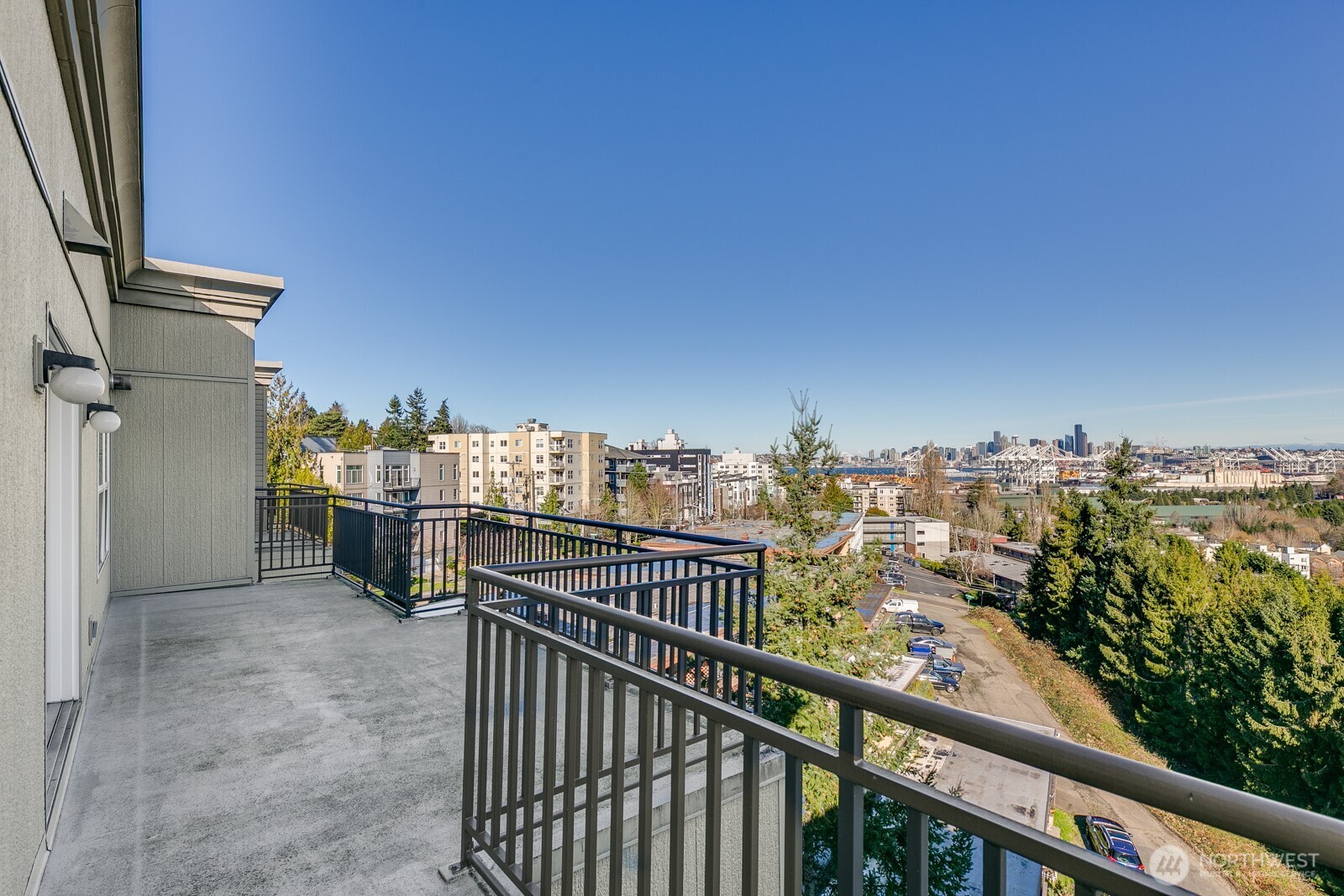 3221 Southwest Avalon Way, Unit 201 Seattle, WA 98126 - Photo 34 of 39 a view of a balcony with city view