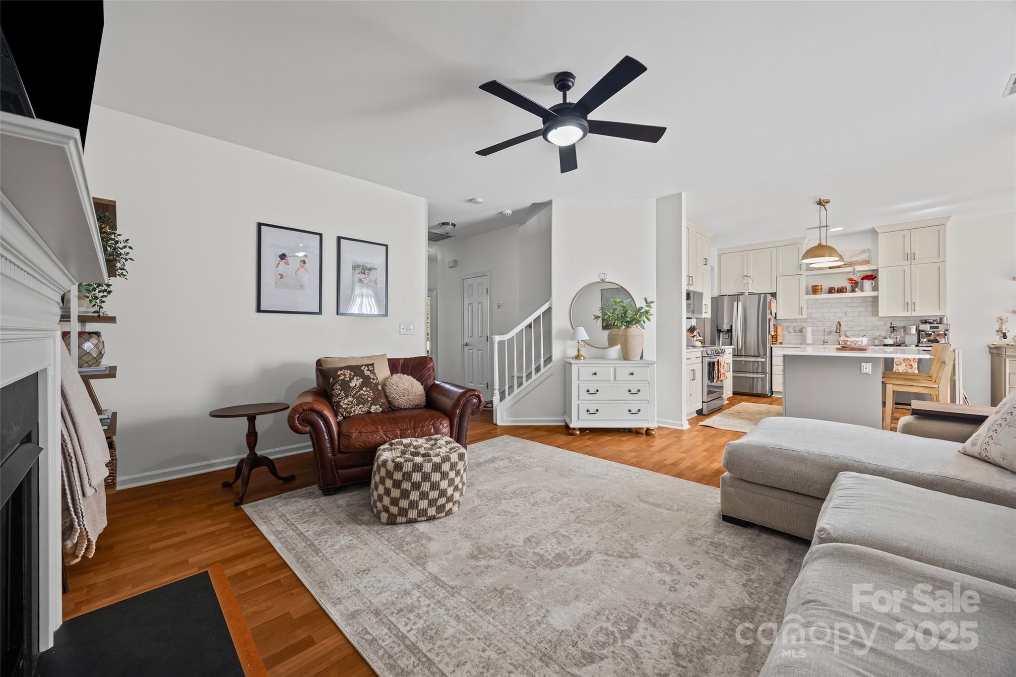 543 St George Road Fort Mill, SC 29708 - Photo 10 of 42 a living room with furniture and a wooden floor