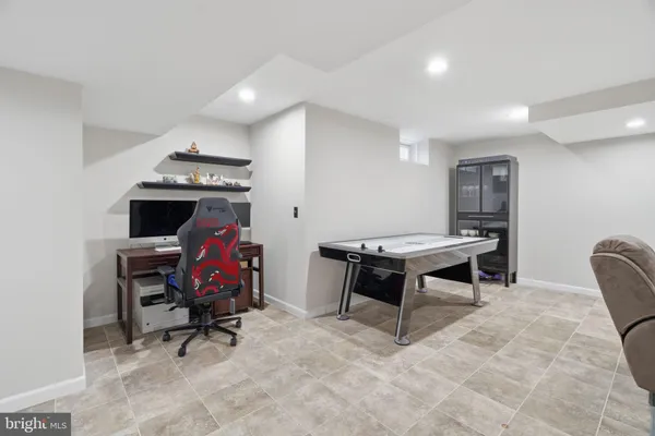 a view of a workspace with furniture