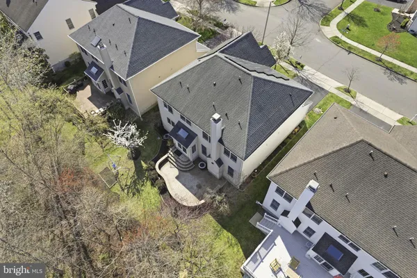 an aerial view of house with yard