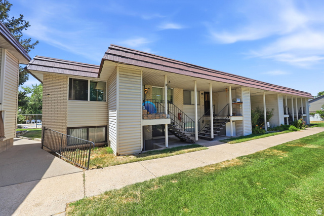 314 West Center Street, Unit F102 Bountiful, UT 84010 - Photo 6 of 29 Multi-unit property featuring a brown metal roof and light-colored siding
