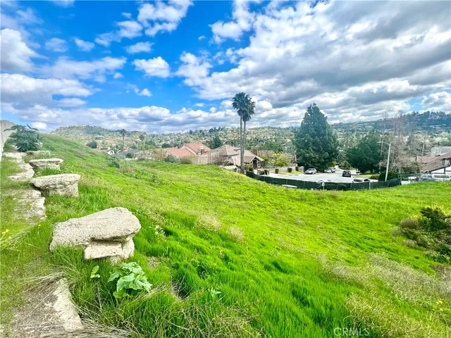 a view of an chairs and table in the garden