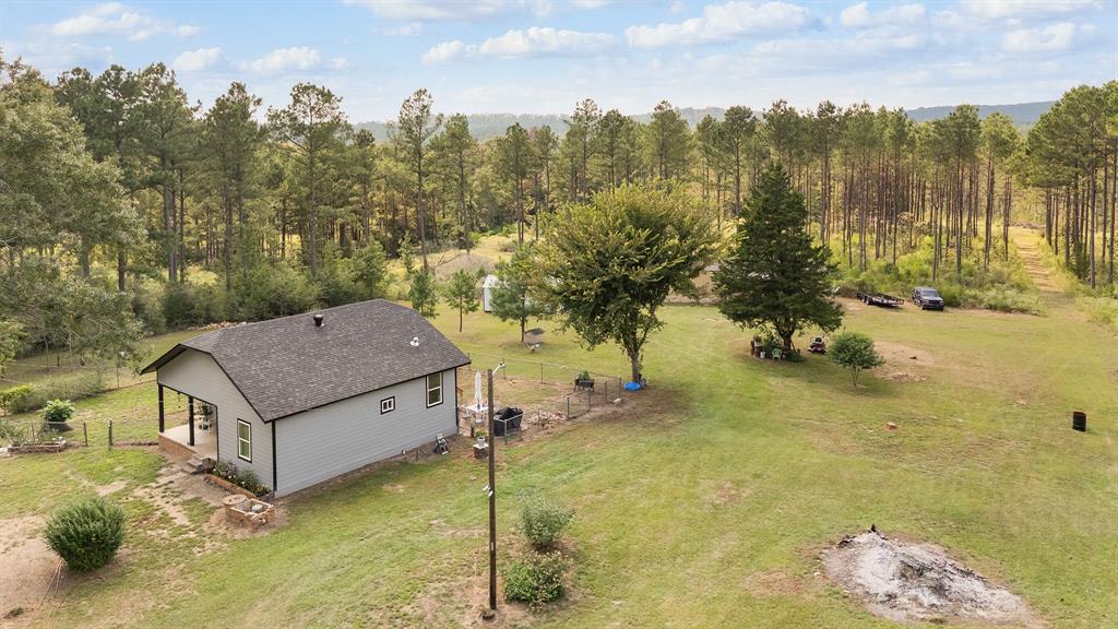 6446 Farm To Market Road 752 Rusk, TX 75785 - Photo 20 of 40 a view of a house with a yard