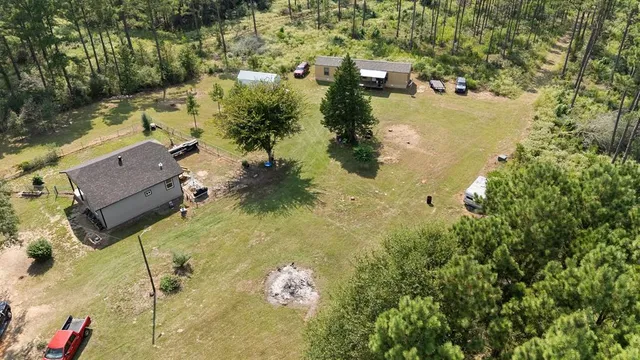 an aerial view of residential house with outdoor space