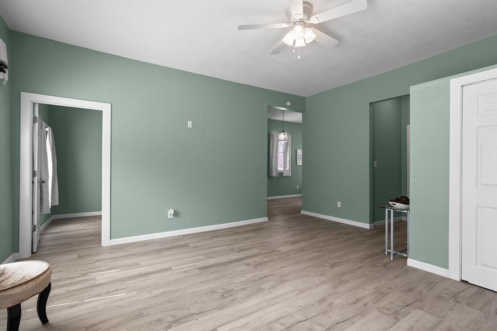 6446 Farm To Market Road 752 Rusk, TX 75785 - Photo 6 of 40 wooden floor in an empty room with a window