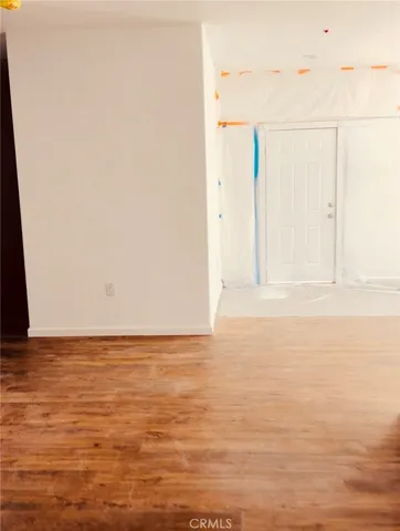 a view of room and an empty room