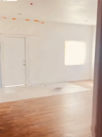 a view of a room with a window