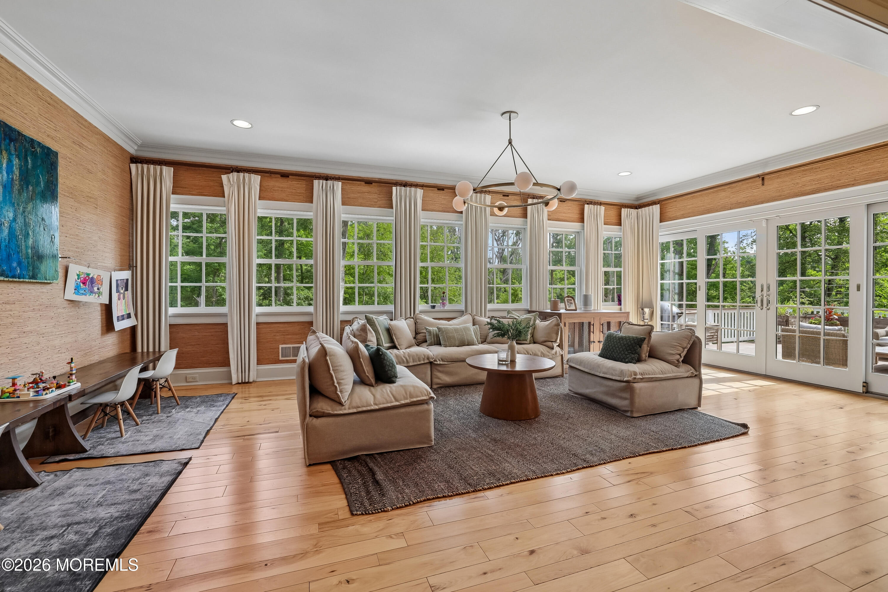 92 Tulip Lane Colts Neck, NJ 07722 - Photo 15 of 55 a living room with furniture and a large window